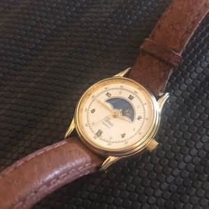 Vintage timex quartz with date and sun/moon phase